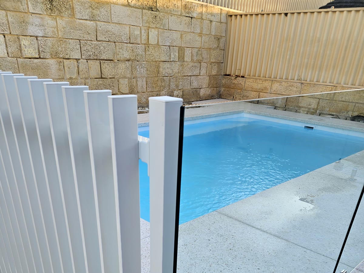 White picket pool fencing on limestone, Perth